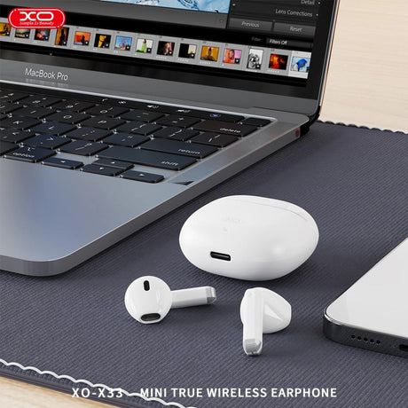 XO X33 Bluetooth slušalice uz laptop
